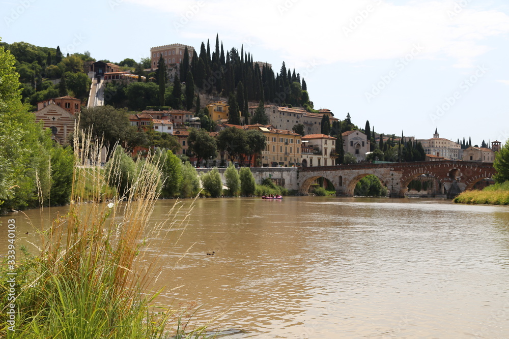 Verona - Adige panorama and rafts on the Adige.