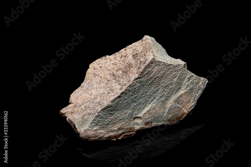 Zeolite natural raw stones on black background. Macro shot photo