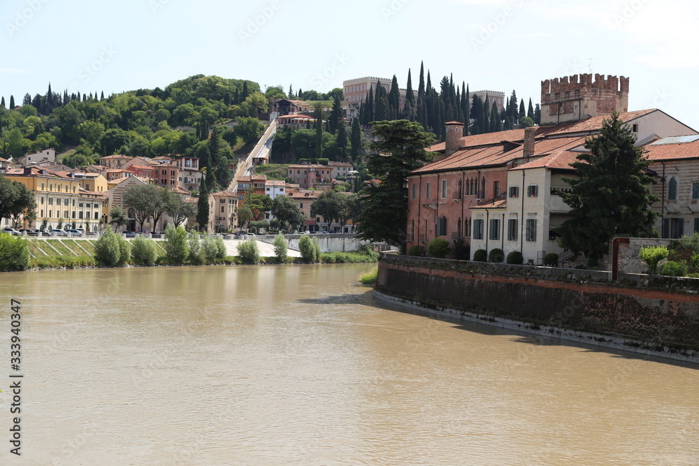 Verona - Adige panorama and rafts on the Adige.