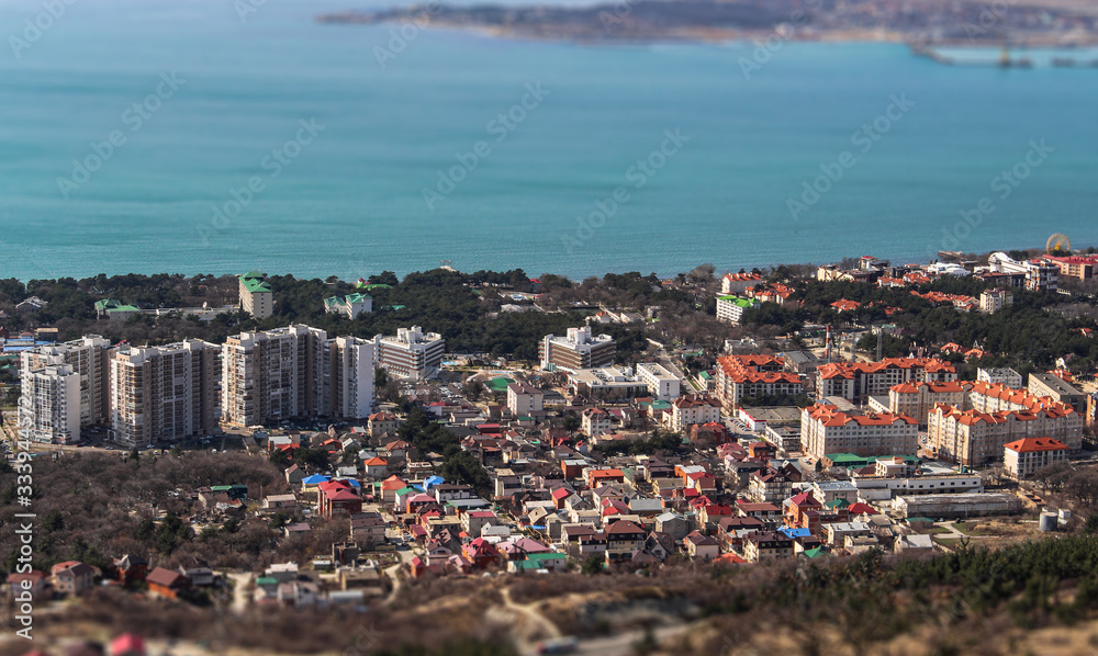 Gelendzhik, Black sea coast, creative idea with an effect of blurring and miniatures of buildings. Tilt-shift effect