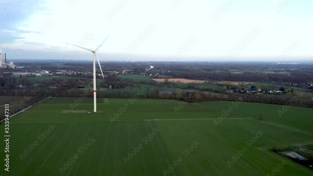 Modernes Windrad vor dem Kohlekraftwerk Datteln IV Modernes Windrad vor dem Kohlekraftwerk Datteln IV