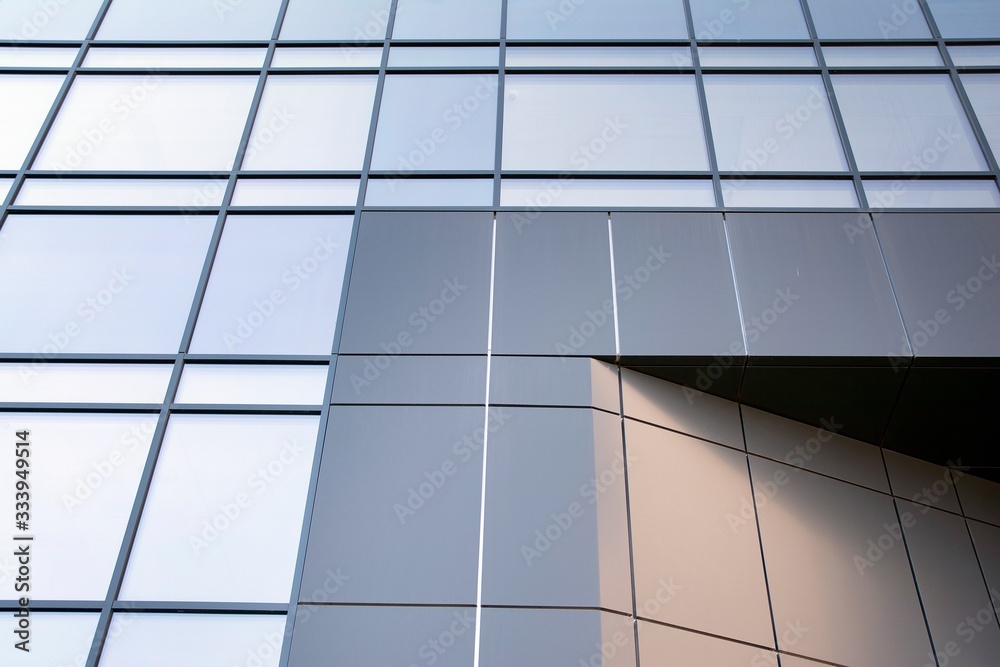 Abstract texture and blue glass facade in modern office building. Abstract texture and blue glass facade in modern office building.