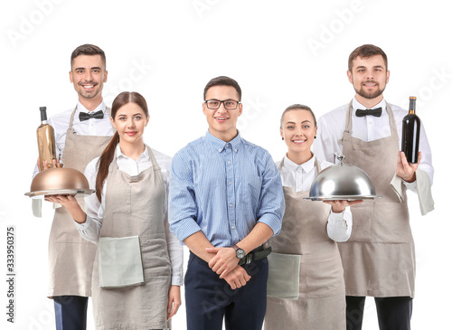 Group of waiters with teach...