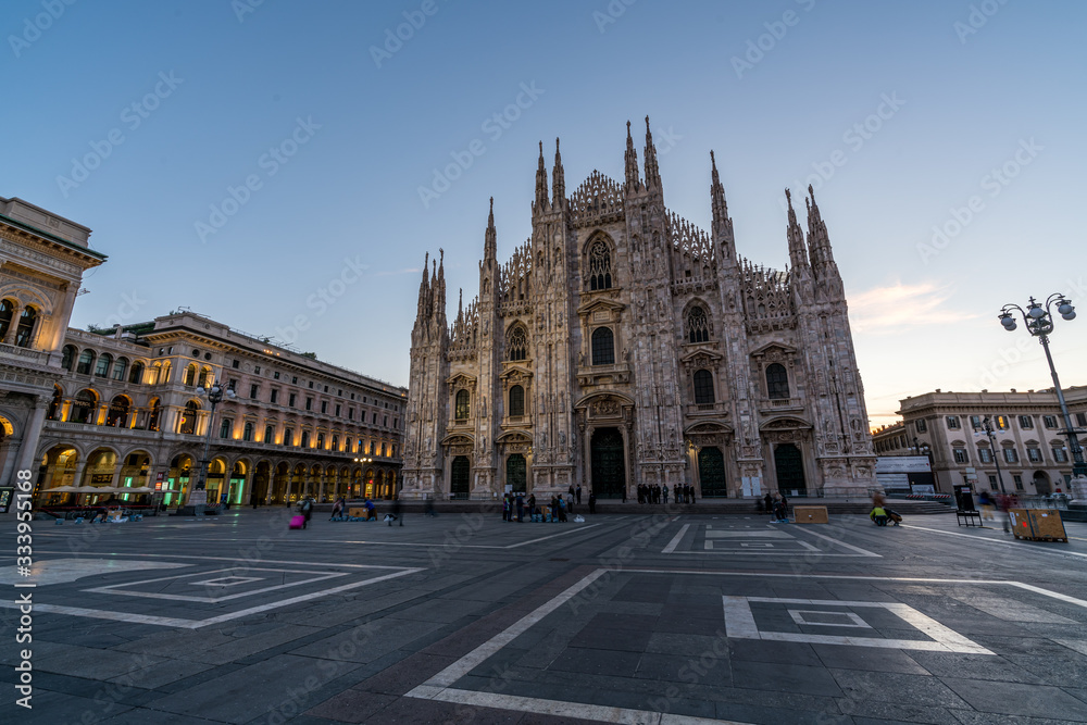 Duomo di Milan , the most famous gothic white marble cathedral church of Milan, in the morning, Italy.
