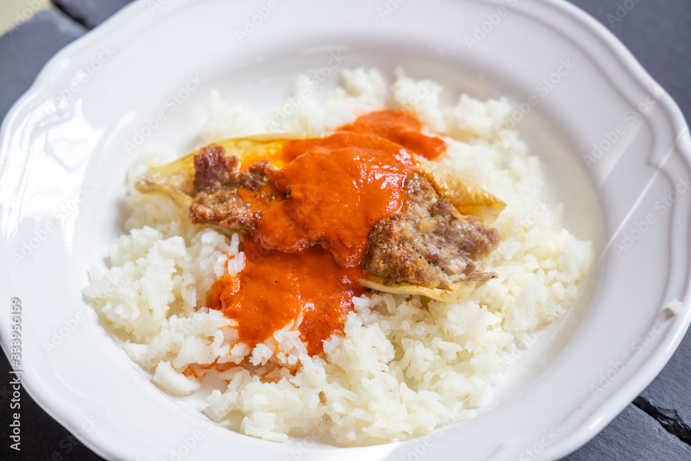pepper filled with minced meat with tomato sauce and rice pepper filled with minced meat with tomato sauce and rice
