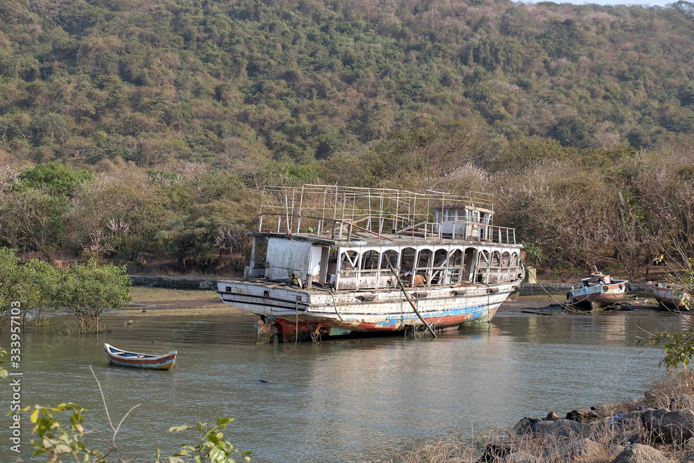 Abandoned tourist boat on Elefanta Island near Mumbai, India Abandoned tourist boat on Elefanta Island near Mumbai, India