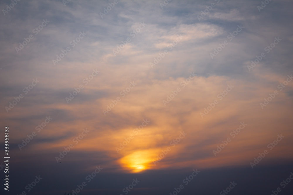 Scenic view of the sky with clouds during sunset in cityscape