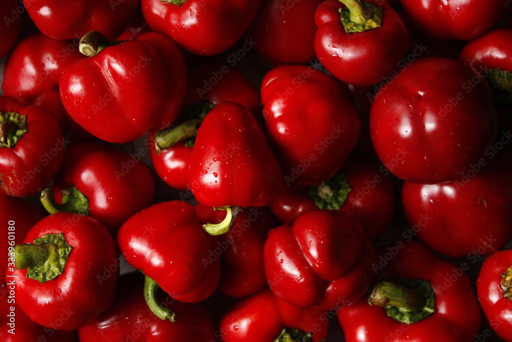 Macro photo of lots of red paprica. Texture or pattern of fresh ripe vegetables Macro photo of lots of red paprica. Texture or pattern of fresh ripe vegetables
