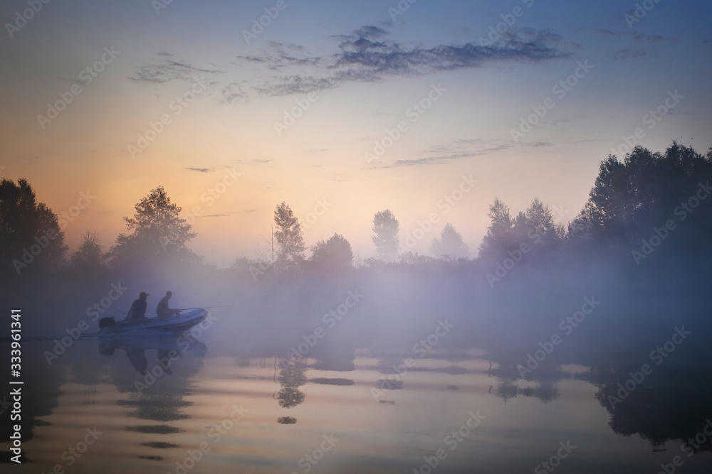 Obraz premium Fishing background. A pair of anglers enjoy.