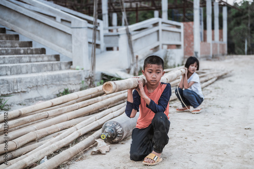 Children are forced to work in construction areas. Human rights concepts, December 10 Stop child abuse, violence, fear of child labor and human trafficking.