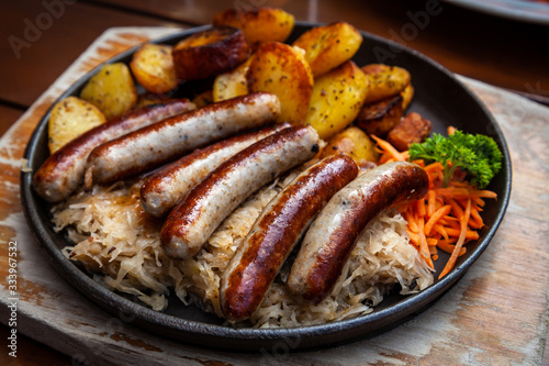 German Sausage with Sauerkraut and Potatoes