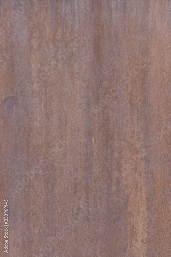 The surface is painted rust. Rusted metal wall. Metal rust background .Grunge rusty metal texture 
