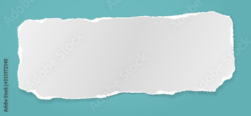 Piece of torn white note, notebook paper with soft shadow stuck on blue background. Vector illustration