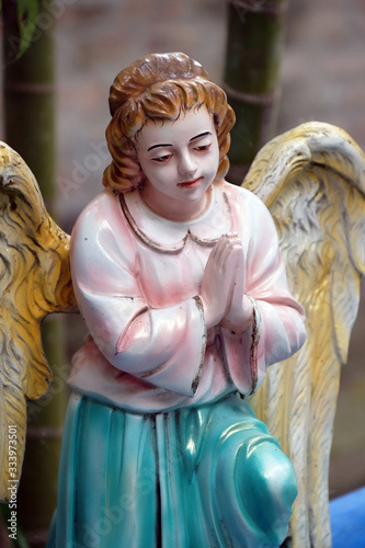 Angel at the Tomb of the Croatian Jesuit Missionary Ante Gabric Behind the Catholic Church in Kumrokhali, West Bengal, India photo