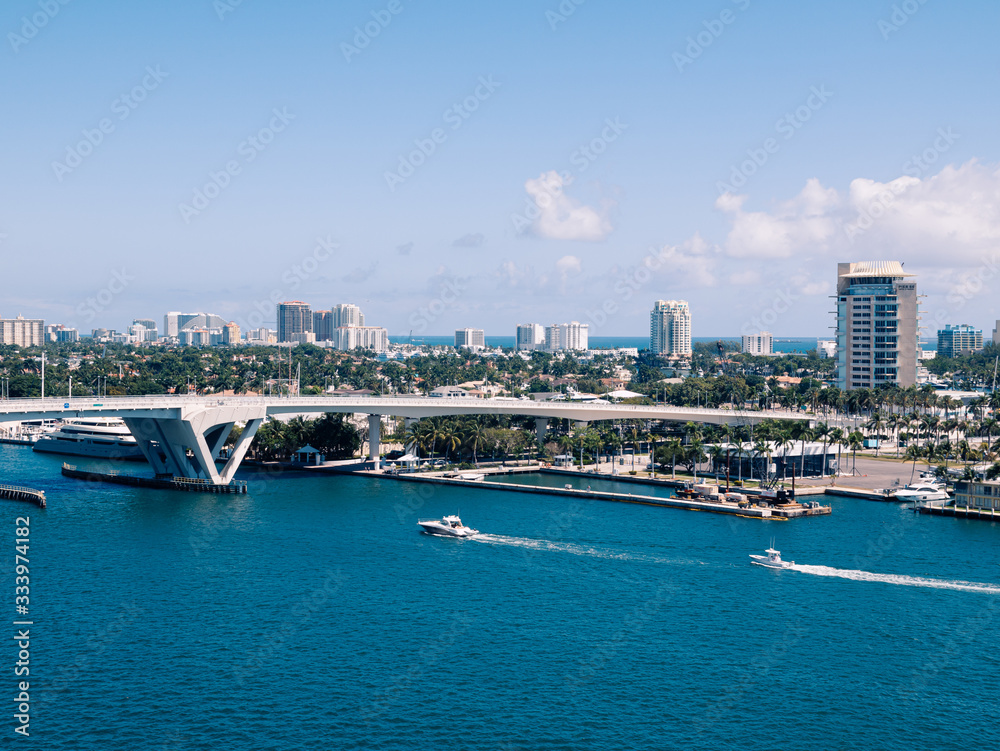 Obraz premium Miami, USA - March 29,2020: casual view on the buildings and streets near port Everglades at sunny weather