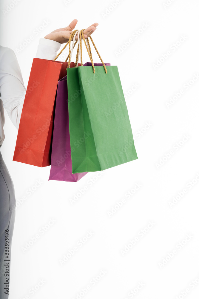 Muslim girl shopping bags closeup