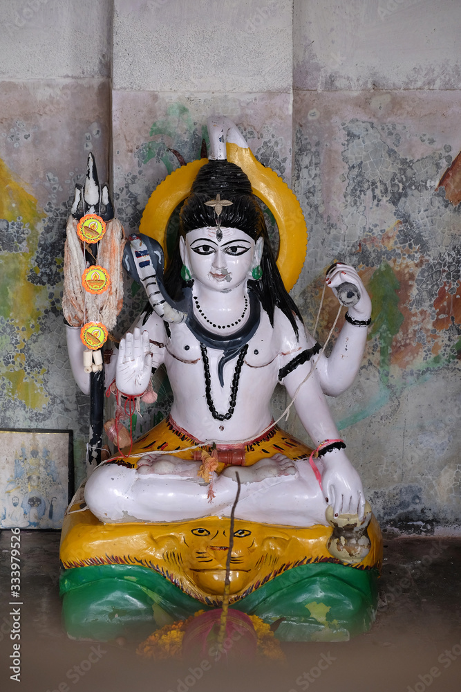 Statue of Lord Shiva in Hindu temple in Sambhunagar village, West Bengal, India