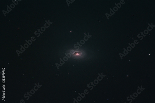 The Black Eye Galaxy Messier 64 in the constellation Coma Berenices photographed from Mannheim in Germany. photo
