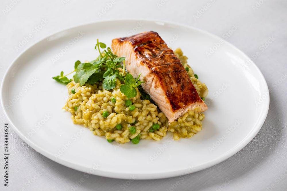 Green peas risotto with grilled salmon