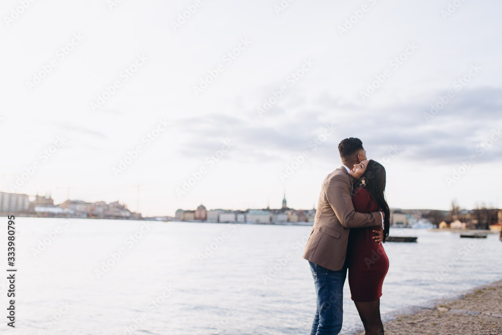 Loving happy couple hugging outdoors together. Dating and romance time for loving people. Proposal concept