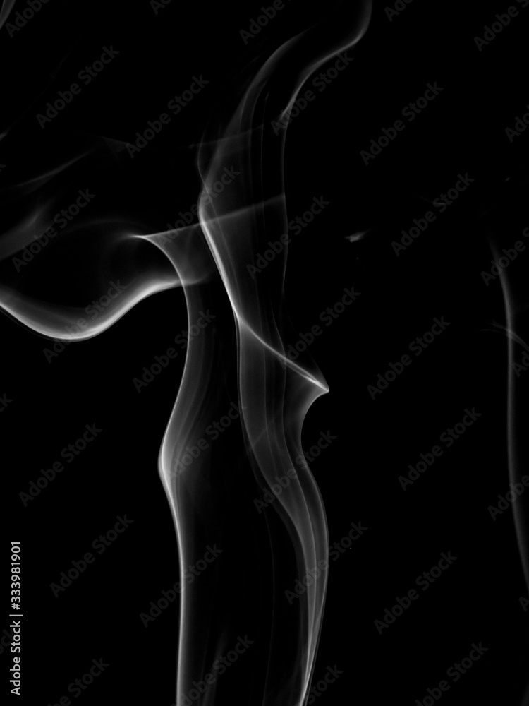 Cigarette smoke on black background, macro shot Cigarette smoke on black background, macro shot