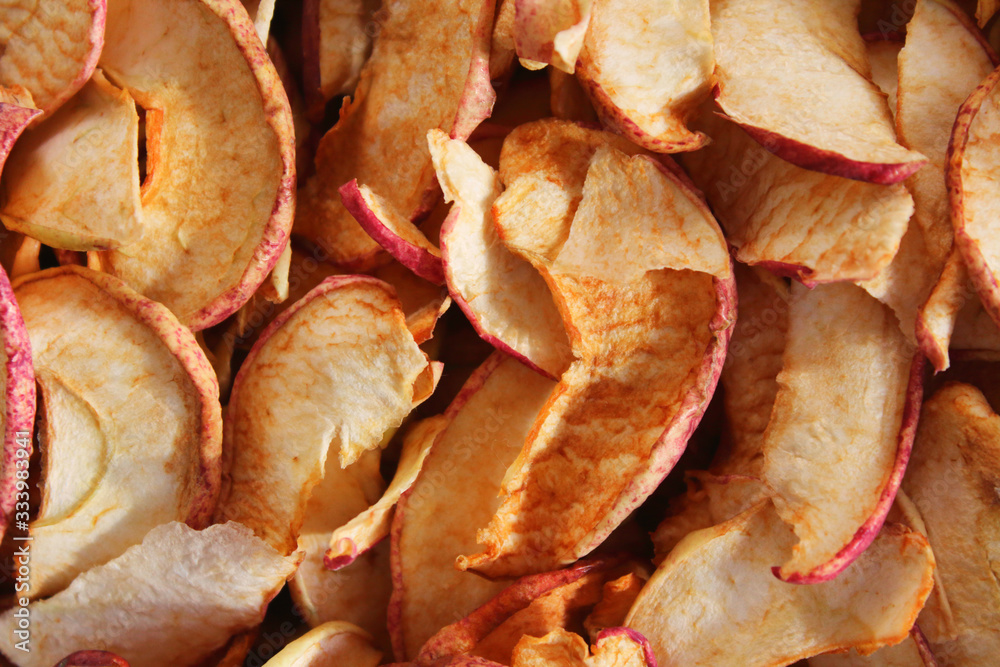 Sliced dried apples. Close-up. Top view. Background. Texture.
