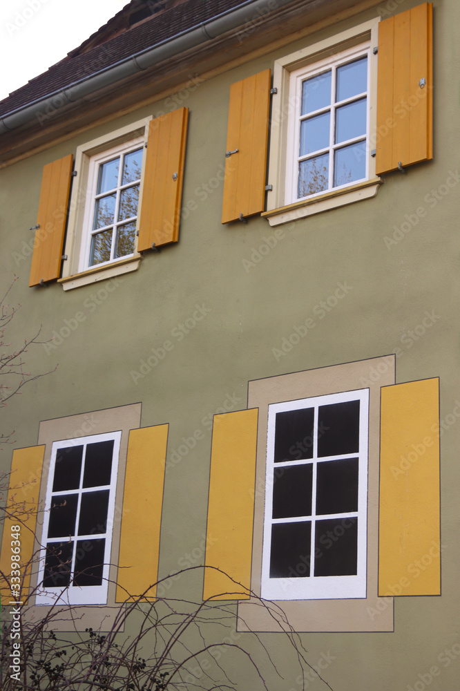old house with real windows and painted windows old house with real windows and painted windows