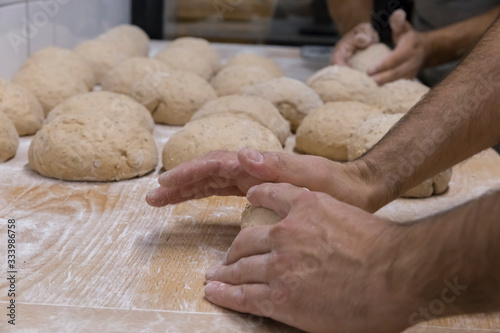 Baker preparing the bread dough