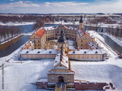 The winter view of Nesvizh Castle in Belarus. Drone aerial photo