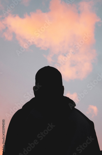 silhouette of a man against sunset