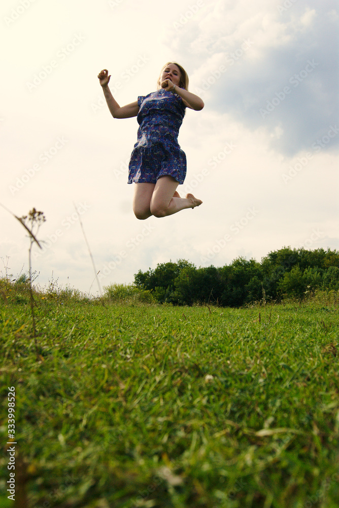 jumping young woman