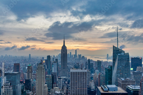 New York skyline from the top of  Top of the Rock  Rockefeller Center sunset view in Winter with clouds in the sky