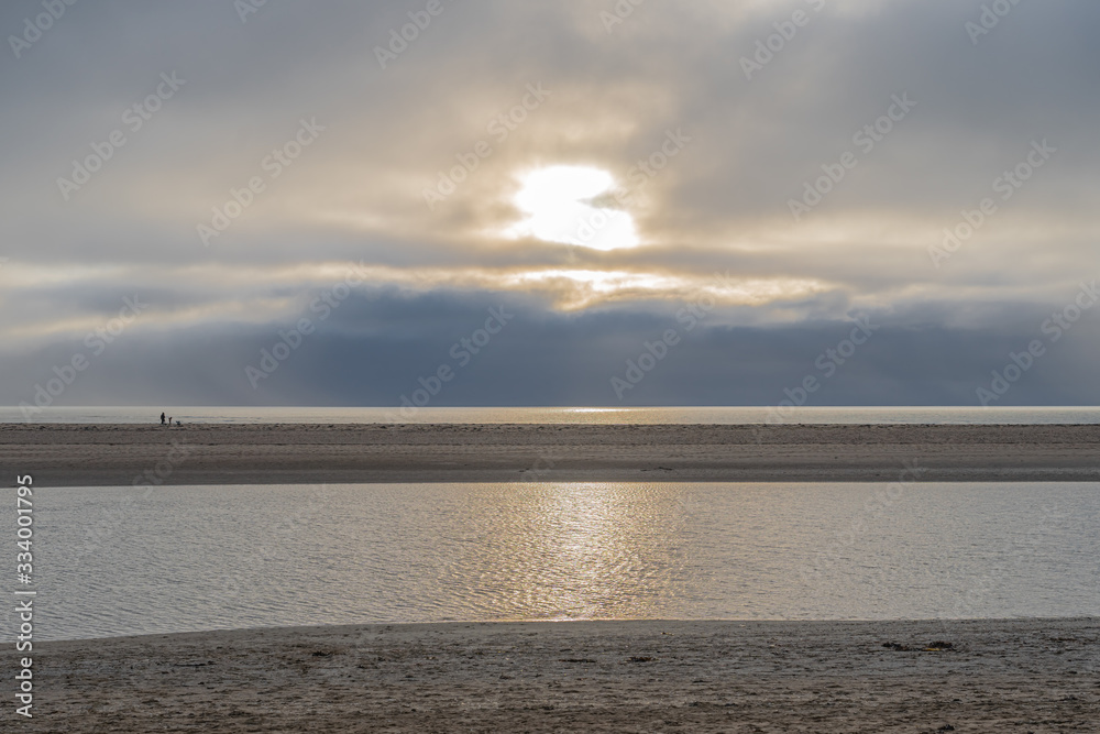 Agon-Coutainville, France - 12 30 2018: Sunset on the beach of Pointe d'Agon