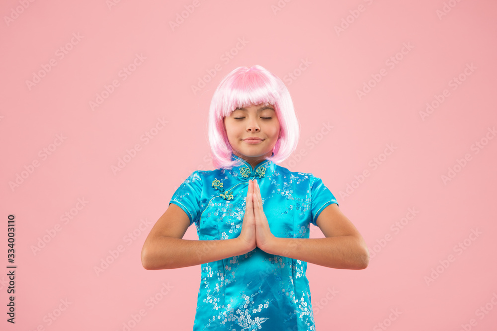 Without a sound. Happy child do meditation holding hands in namaste. Meditation or prayer. Small girl enjoy meditation practice. Meditation and concentration. Zen and enlightenment. buddhist Without a sound. Happy child do meditation holding hands in namaste. Meditation or prayer. Small girl enjoy meditation practice. Meditation and concentration. Zen and enlightenment. buddhist