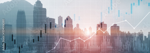 Financial concept investment graph chart diagram double exposure city view skyline. photo