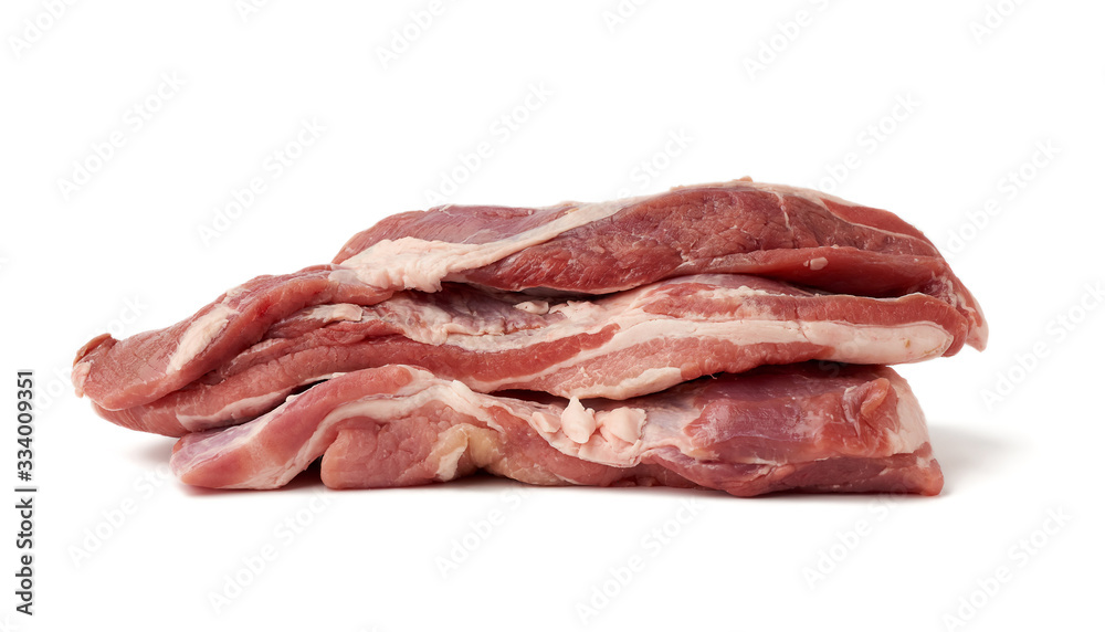 stack of pork raw meat, tenderloin with layers of fat isolated on a white background