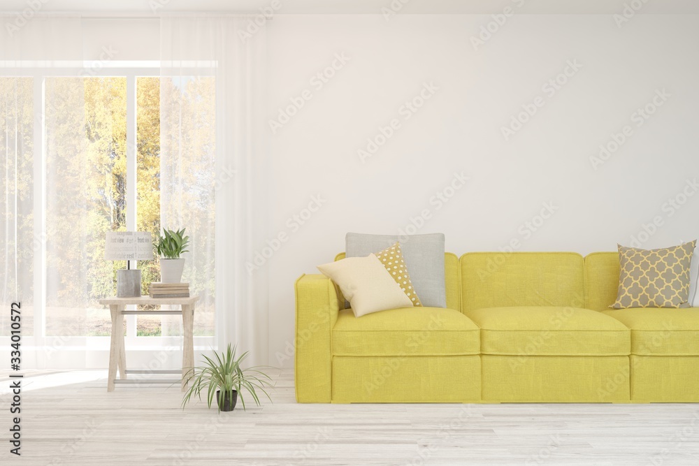 Fototapeta premium Stylish room in white color with sofa and autumn landscape in window. Scandinavian interior design. 3D illustration