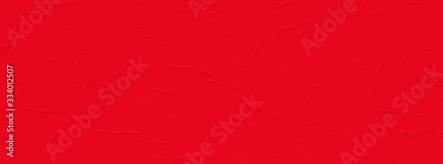 Banner rough red color textured concrete background.