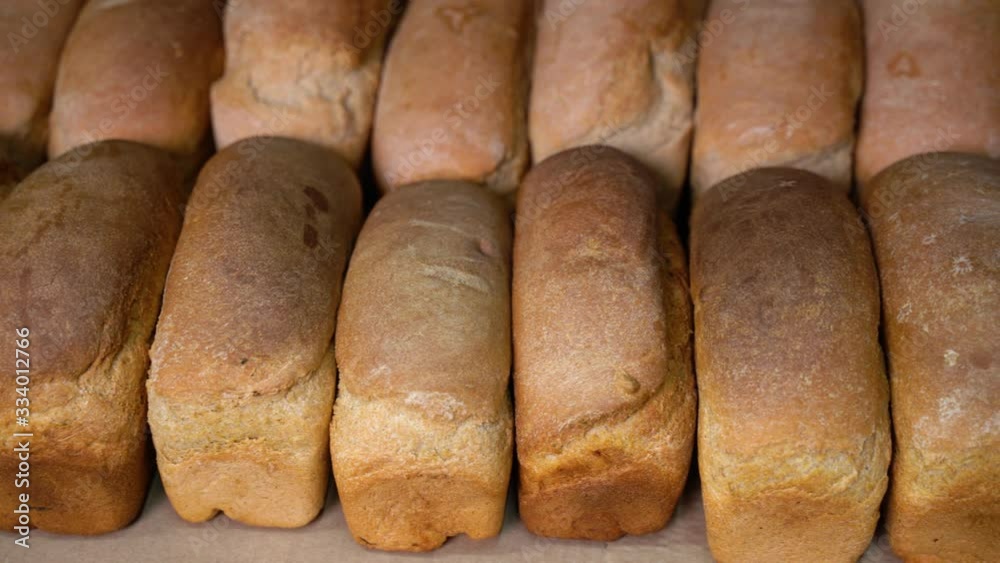 loaf of bread on a shelf in a store loaf of bread on a shelf in a store