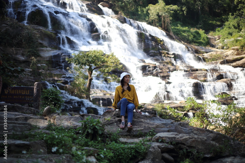 Women the view in Mae Ya waterfall at Doi Inthanon national park, Chiang Mai, Thailand