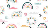 Seamless vector pattern with hand drawn rainbows and sun.