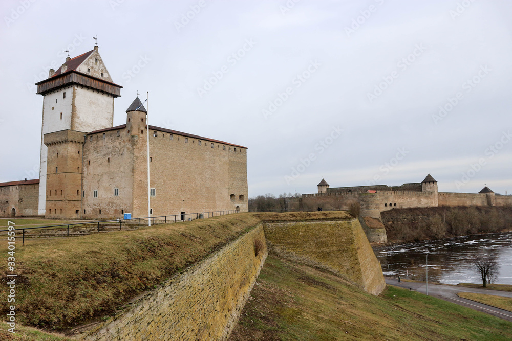View of medieval Hermann Castle opposite Ivangorod Fortress ,with Narva River in between