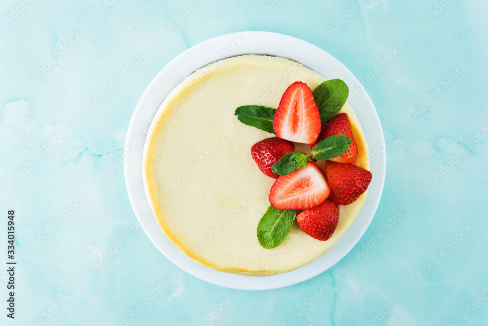 Cheesecake with fresh strawberries and mint leaves Cheesecake with fresh strawberries and mint leaves