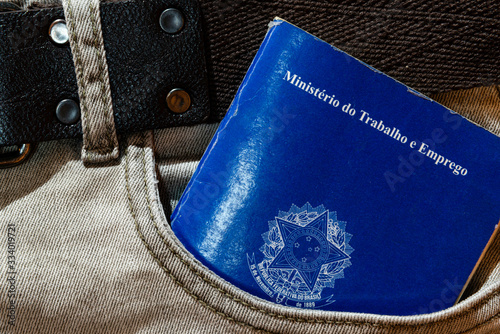 Brazilian work card inside worker jeans pocket.