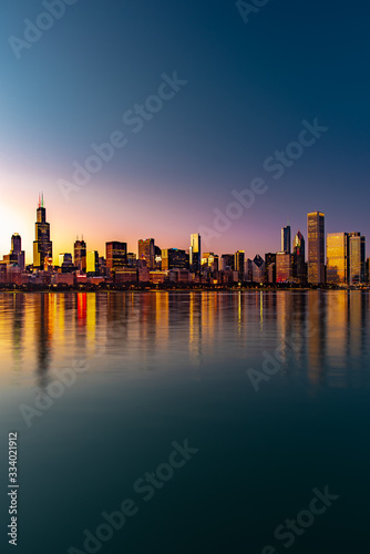 Chicago downtown skyline sunset Lake Michigan with most Iconic building from Adler Planetarium  Illinois