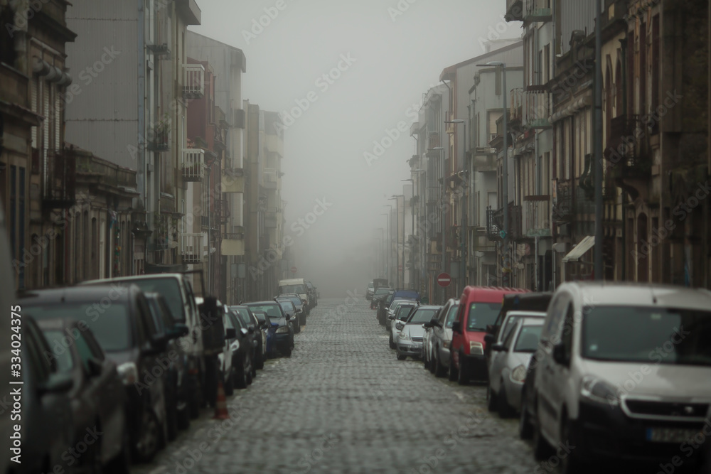 View of the street in cloudy weather of the old center of Porto, Portugal.
