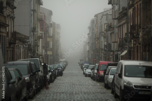 View of the street in cloudy weather of the old center of Porto, Portugal.