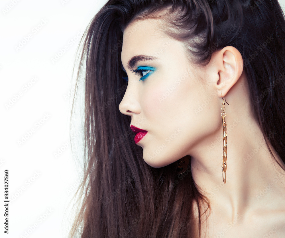 Fototapeta premium Sexy Beauty Girl with Red Lips and Nails. Provocative Make up. Luxury Woman with Blue Eyes. Fashion Brunette Portrait isolated on a white background. Gorgeous Woman Face. Long Hair