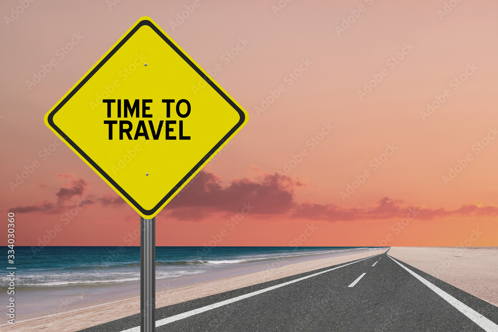 Time to travel sign on beach background.