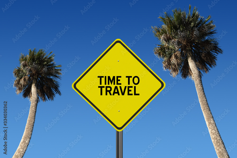 Time to Travel sign on palm tree background Time to Travel sign on palm tree background